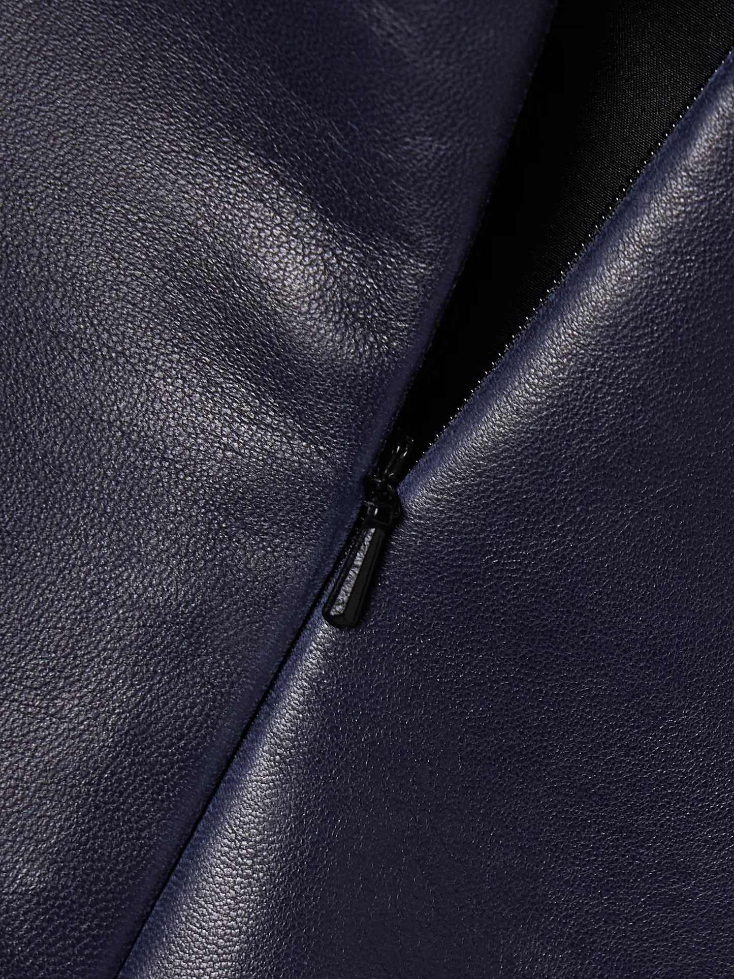 KHAITE Jett leather mini skirt